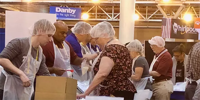 Meal packing event with No Child Hungry